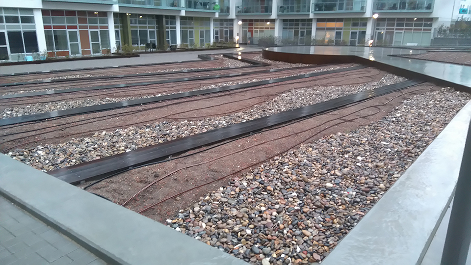 Belægning og opholdszone ved boligprojekt